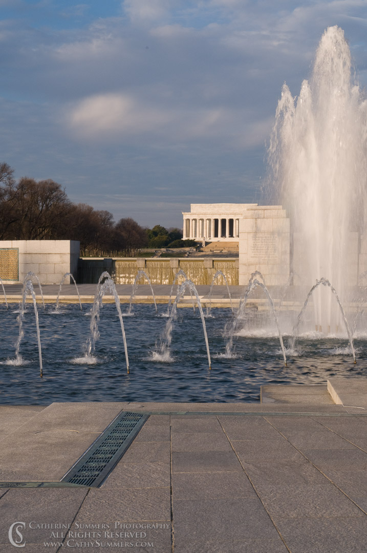 Title: World War II Memorial Fountain and Lincoln Memorial; Keywords: clouds, DC, fountain, Lincoln Memorial, Washington, World War II Memorial