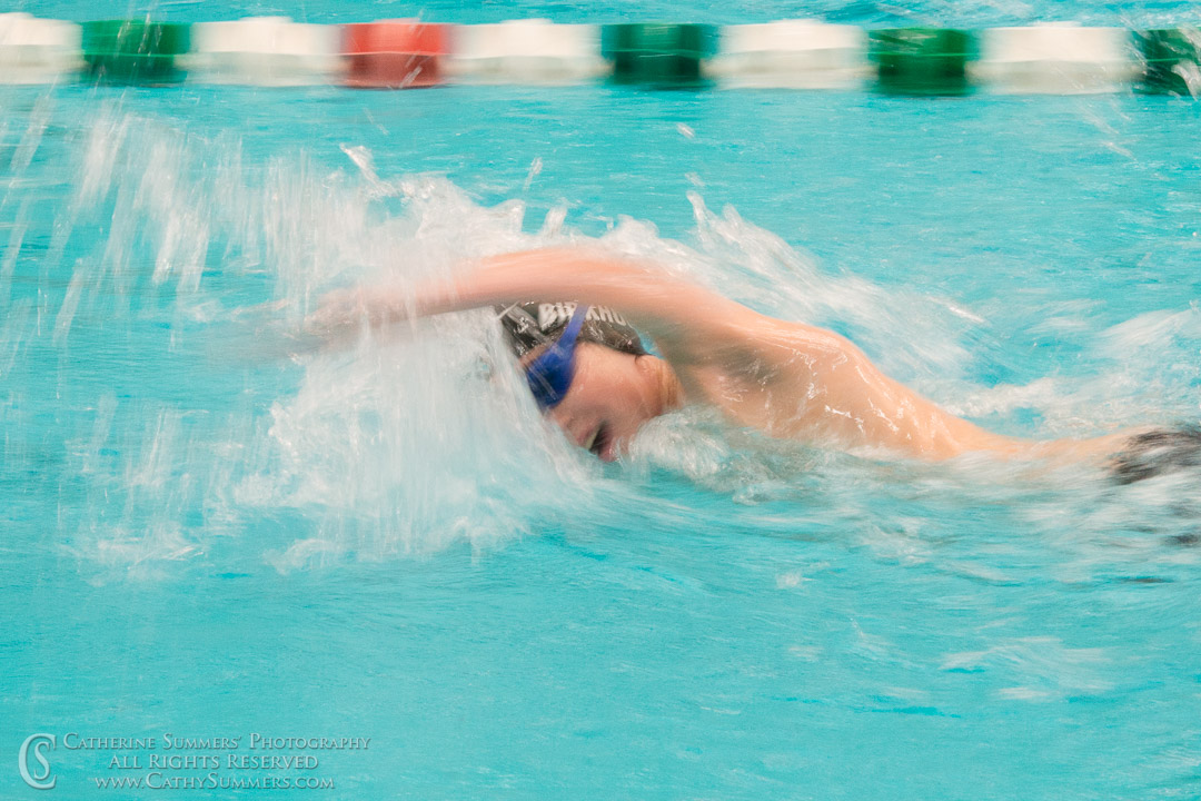 Freestyle Swimmer with a slow shutterspeed and panning blur