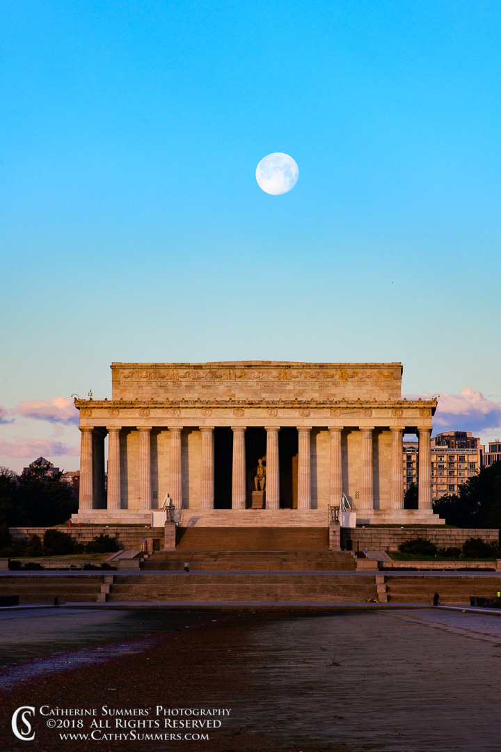 Full Moon Sets Over the Lincoln Wemorial and an empty Reflecting Pool: Washington, DC