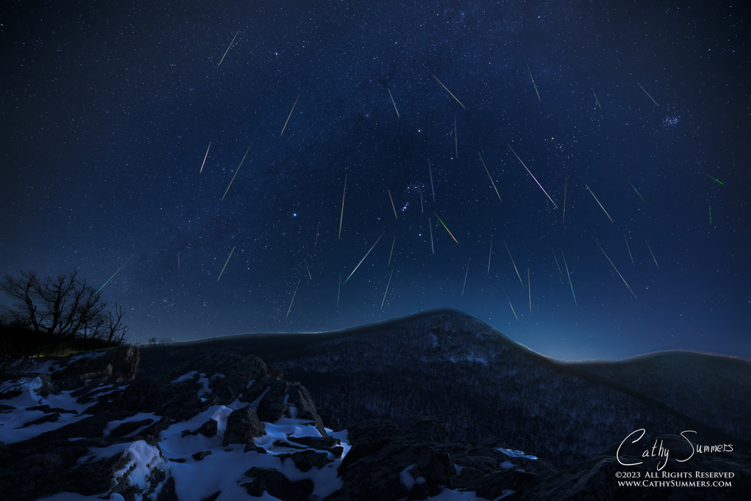 Geminids Over Hawksbill - Composite Photo: 16 stacked images for the sky, 42 meteorite trails, 1 foreground photo at blue hour