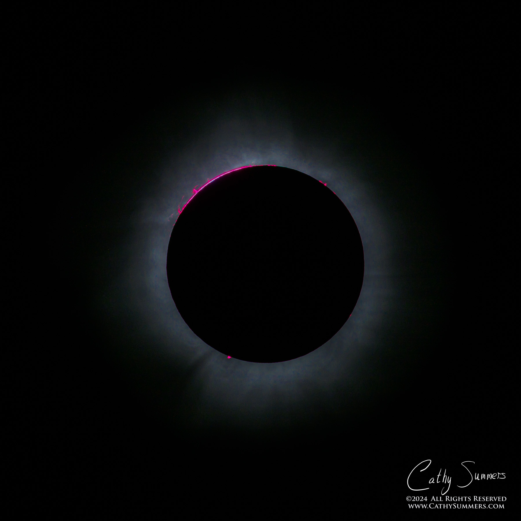 Solar Prominences and Baileys Beads As the Corona Emerges During Totality