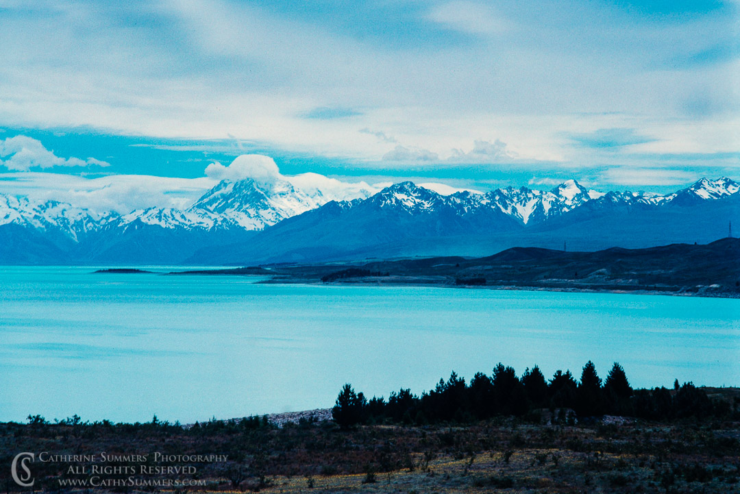 1988_NZ_007: clouds, horizontal, lake, mountains, South Island