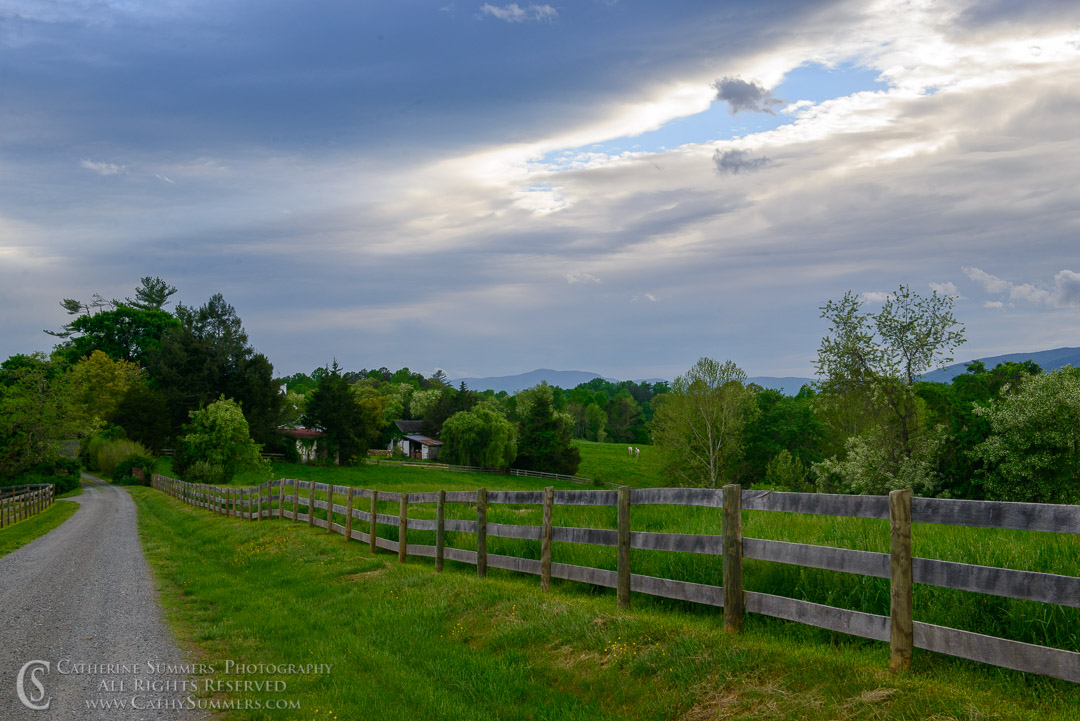 Farm Driveway as a Storm Builds Over the Blue Ridge Mountains