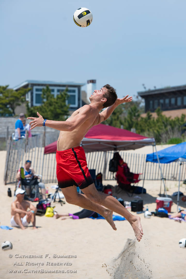 Beach Volleyball - Young Man Jump Serving: Rehobeth Beach, Delaware