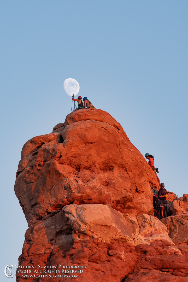 Moon and Climbers: Arches National Park