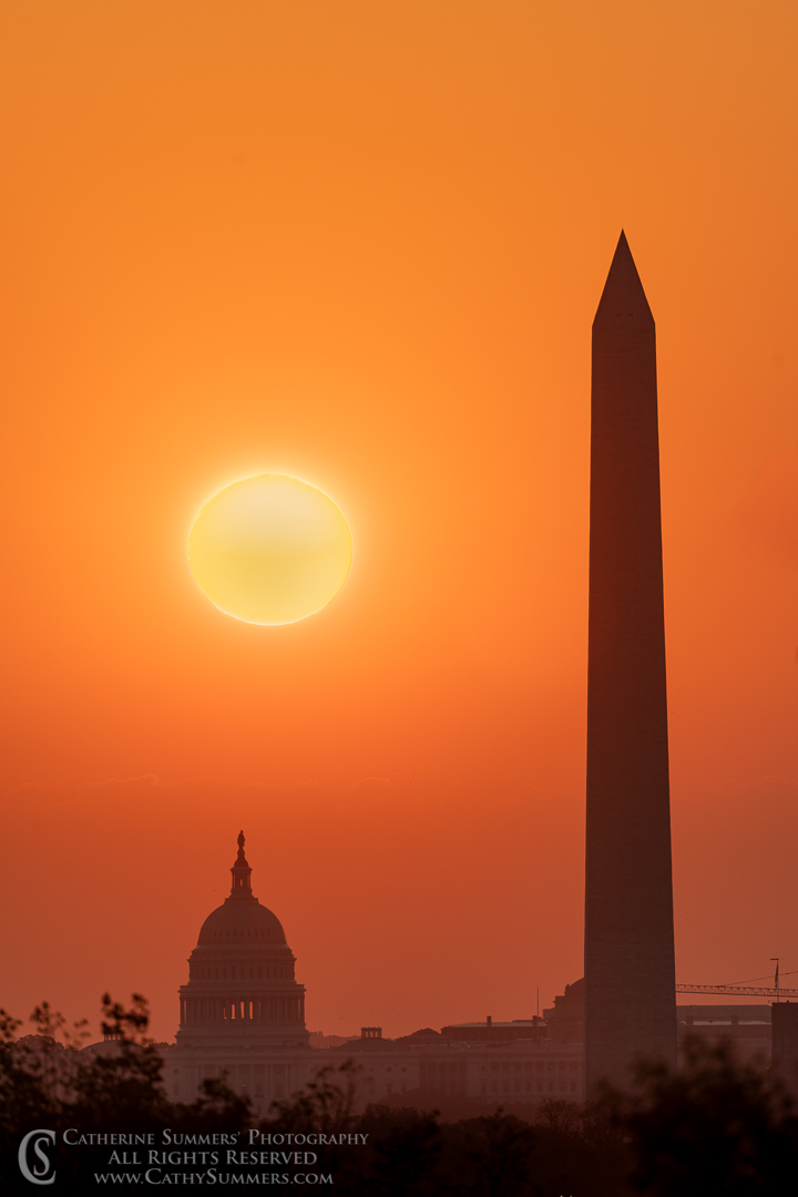 Sun Rises Over the US Capitol and Washington Monument