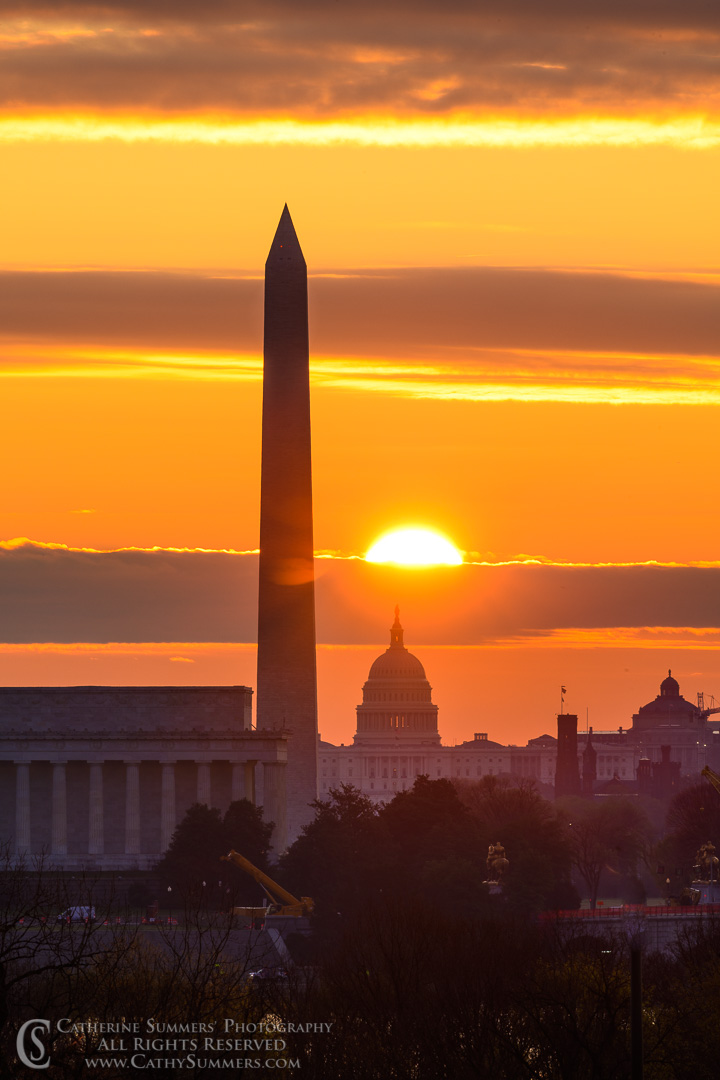 Sun Rises Over the US Capitol and Washington Monument