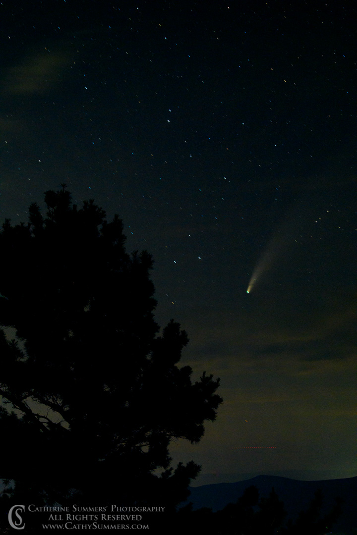 Comet NEOWISE Over the Shenandoah Valley. Thirty second exposure with no star tracker, so the stars and the head of the comet show as little tracks instead of points.