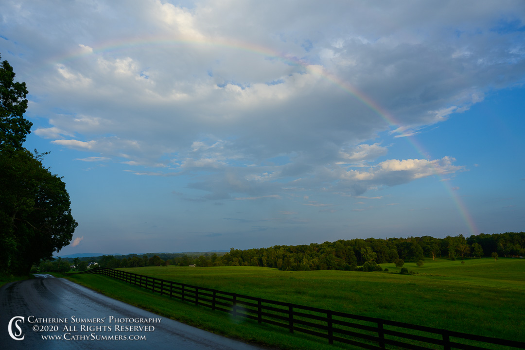20200810_003: clouds, horizontal, fence, summer, field, road, farm, rainbow