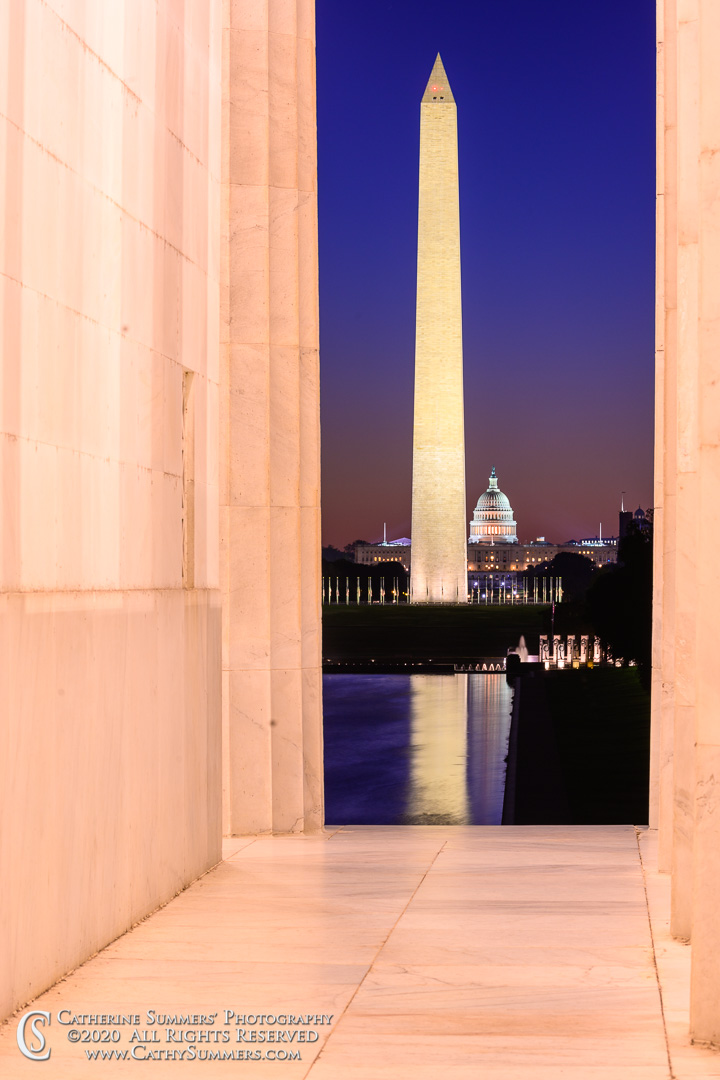 Washington Monument and US Capitol Framed by the Lincoln Memorial as Dawn Approaches