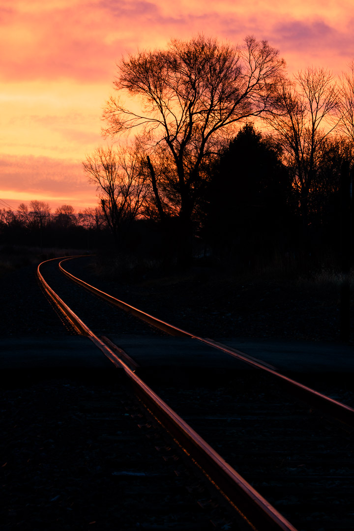 Train Tracks Leading to A Winter Dawn