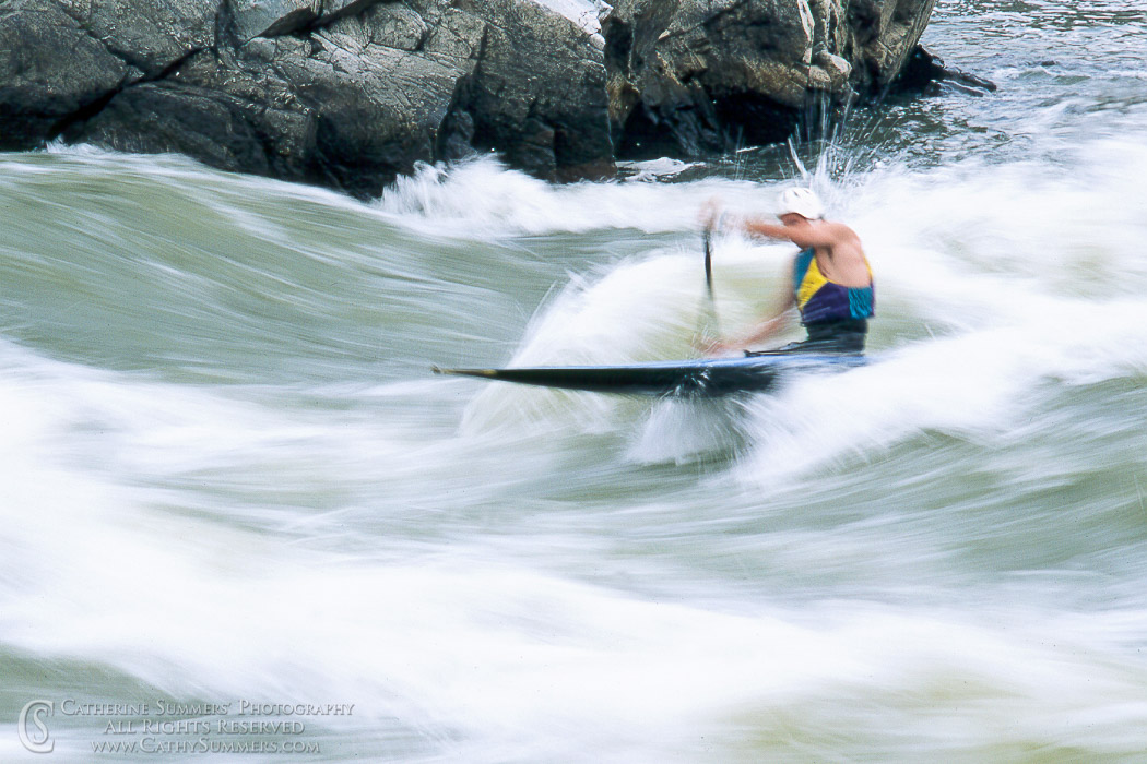 Using a slow shutter speed when the canoeist is at the right spot to remain almost motionless as the Potomac rushes by.: Great Falls National Park, Virginia
