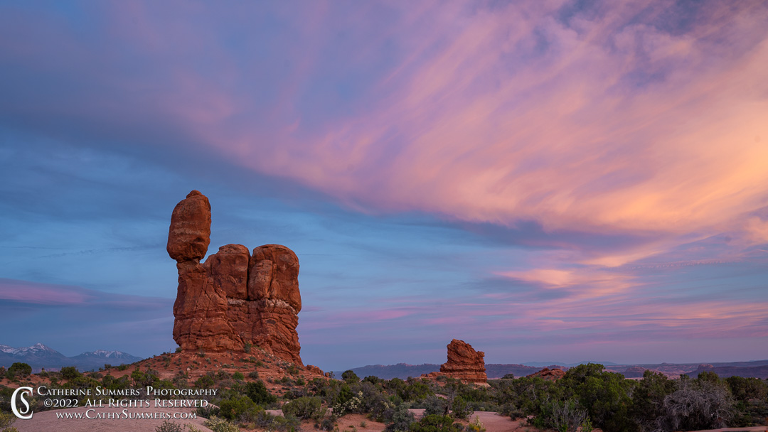 Sunset Clouds Over Balanced Rock in Arches National Park