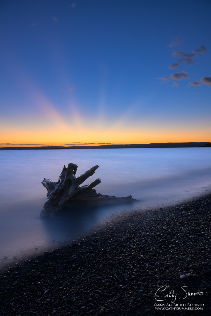 Crepuscular Rays and Sunset Reflection in Yellowstone Lake - Composite Photo