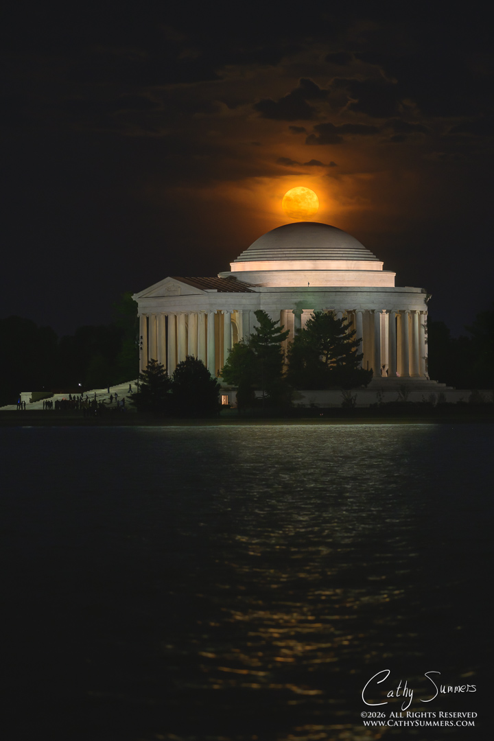 Flower Moon Rises Through the Clouds Behind the Jefferson Memorial